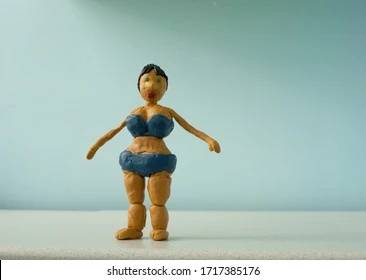 plasticine-woman-blue-swimming-suit-260nw-1717385176.jpeg